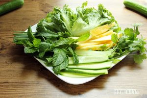 Preparing vegetables and fruits for Vietnamese spring rolls