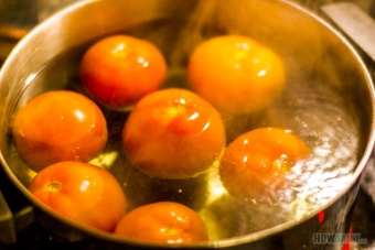Tomatoes in boiling-water