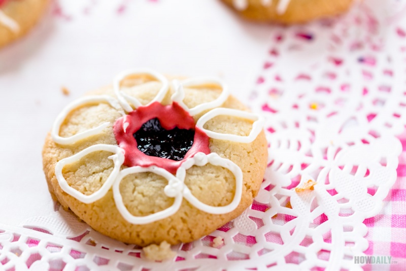 Thumbprint cookie with flower decoration