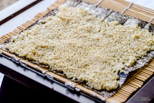 Rolling sushi with quinoa