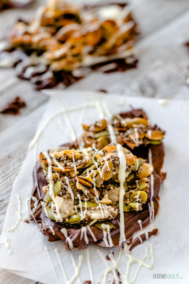 Coconut cluster tops on a marbling chocolate bark